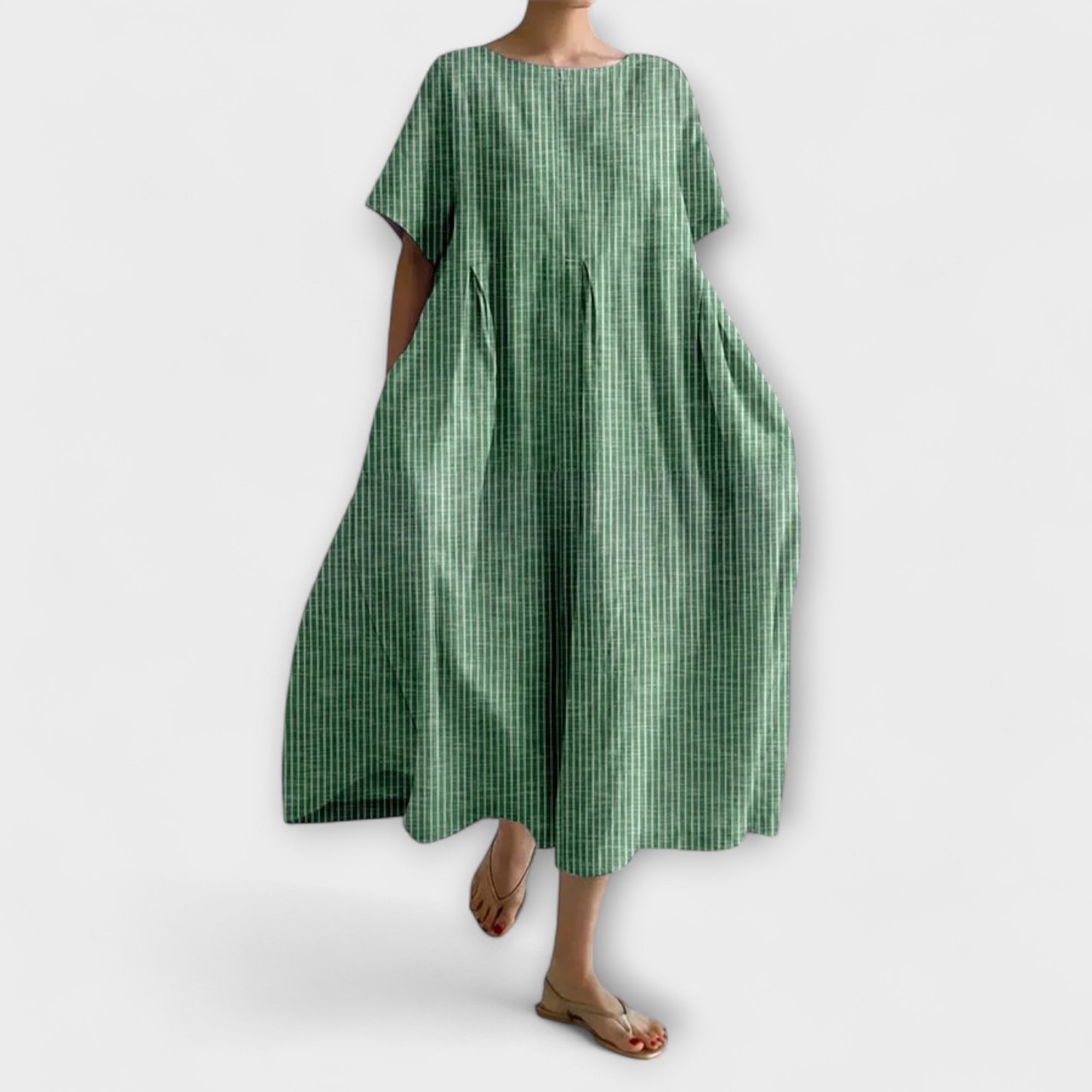 Robe décontractée Andrea de Danoir Paris en tissu léger bleu, style aéré et confortable pour l'été.