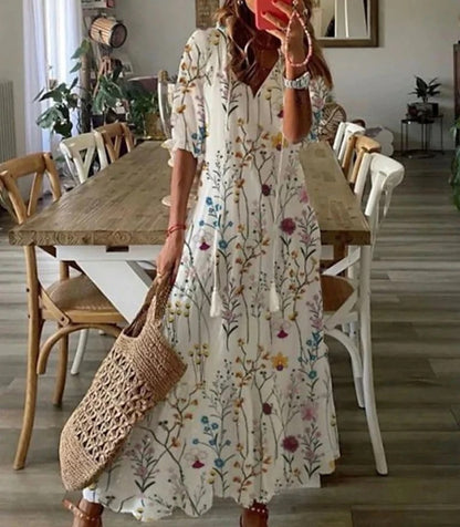 Robe bohémienne légère Danoir Paris Dianna en tissu fluide bleu, détails élégants et style décontracté.