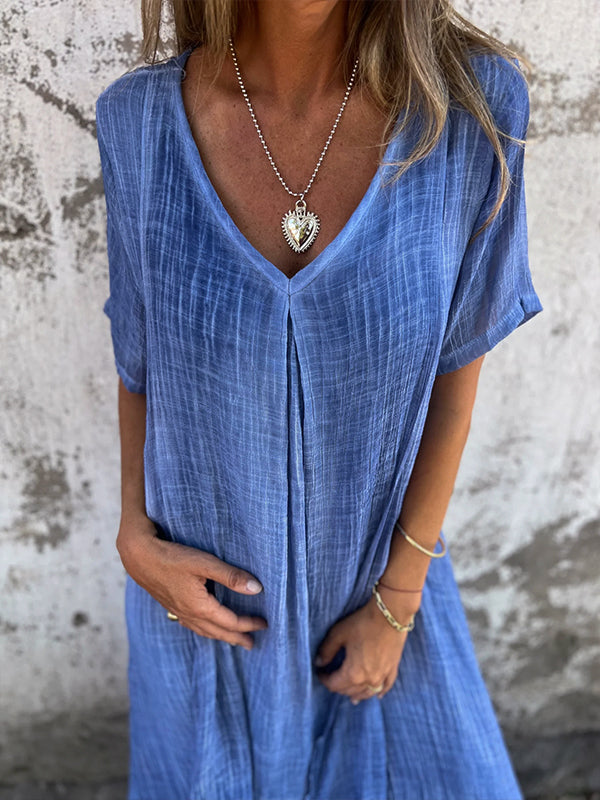 Robe écologique Danoir Paris Málaga élégante en tissu bleu, coupe fluide et style sophistiqué pour femmes.