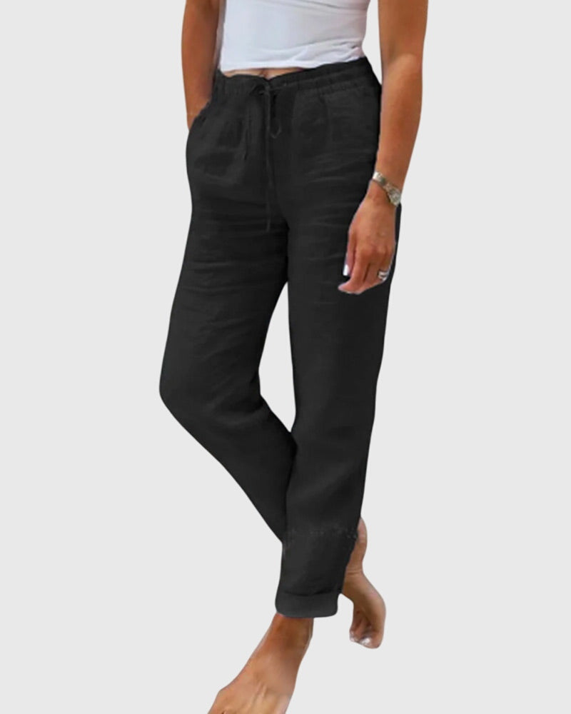 Pantalons élégants pour femmes Margaret™ de Danoir Paris en tissu bleu, vue de face, avec taille et détails de couture visibles.