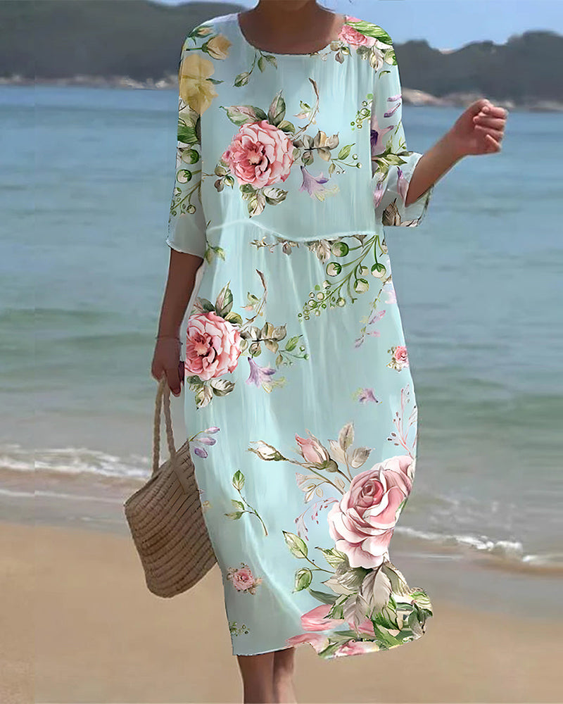 Robe florale chic Miranda de Danoir Paris, en tissu bleu avec motif floral, vue de face.