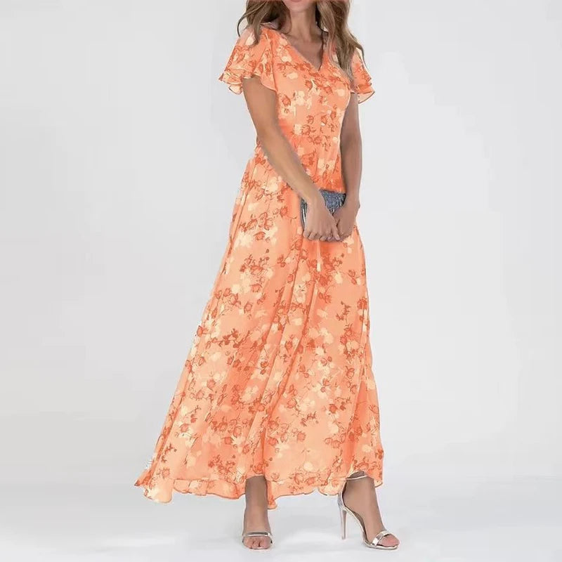 Robe maxi fleurie élégante Robine de Danoir Paris, tissu fluide et motifs floraux, parfaite pour une tenue chic et féminine.