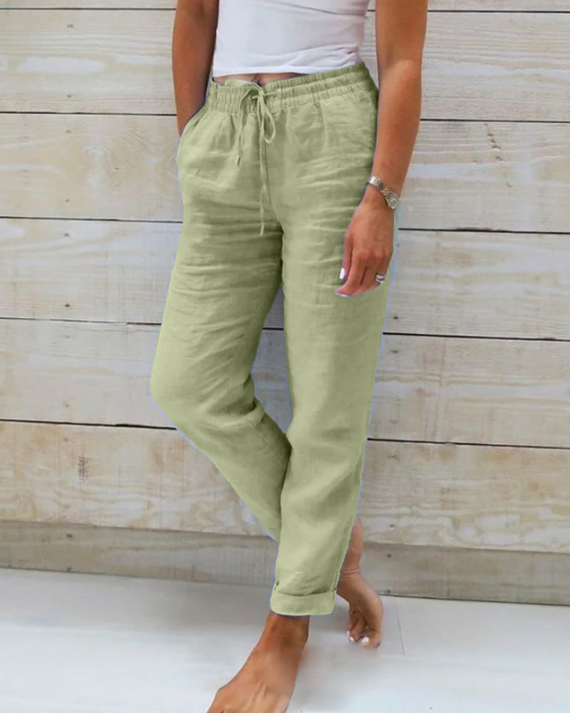 Pantalons confortables et élégants Danoir Paris Susan en tissu bleu, vue de face, pour femme.