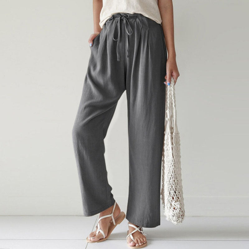 Pantalons relax Danoir Paris Vara en tissu bleu avec corde à taille, vue de face, style décontracté et confortable.