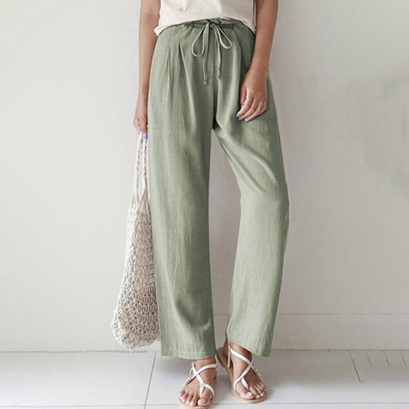 Pantalons relax Danoir Paris Vara en tissu bleu avec corde de serrage et coupe confortable.