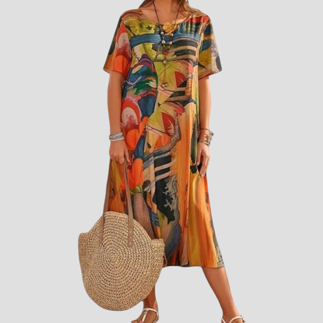 Robe boho confortable Danoir Paris Vittoria en tissu bleu avec détails élégants, vue de face.