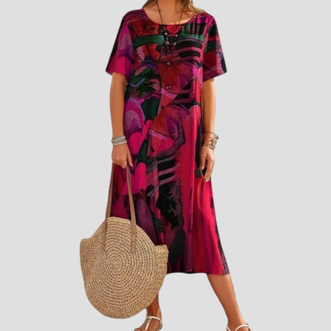 Robe boho confortable Danoir Paris Vittoria en tissu bleu avec détails décontractés.