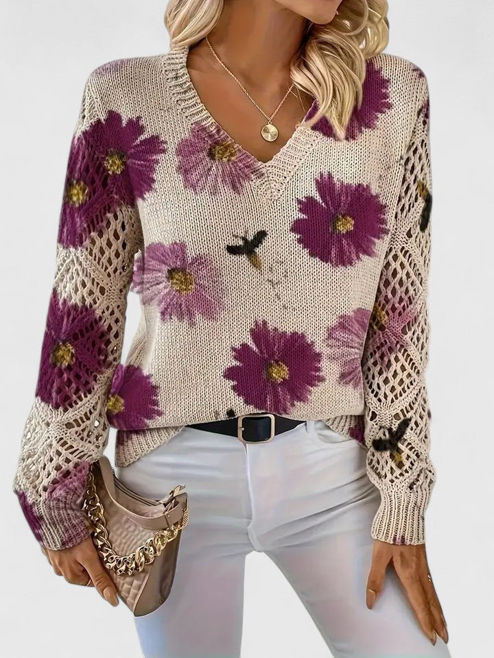 Cardigan floral léger Aurélie de Danoir Paris en tissu bleu avec motifs floraux, vue en gros plan.