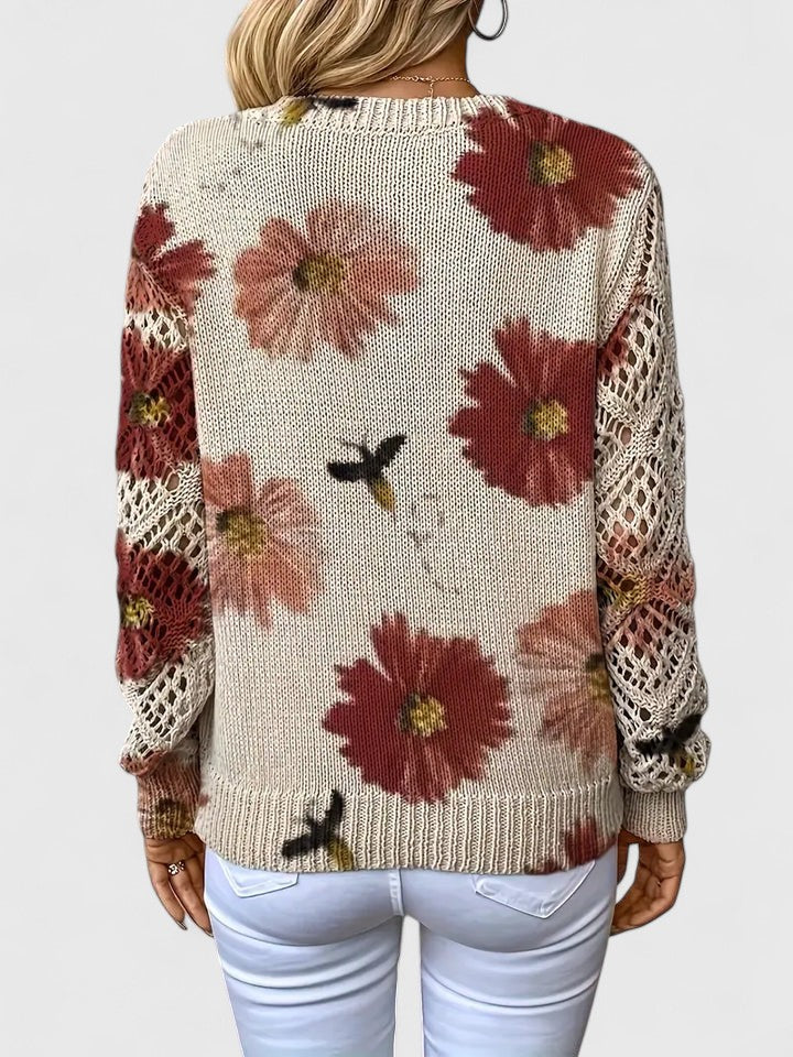 Cardigan léger floral Aurélie de Danoir Paris, en tissu bleu avec motifs floraux, vue de face.