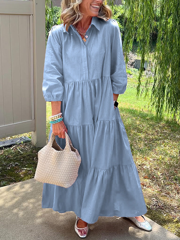 Robe maxi élégante Bente de Danoir Paris en tissu bleu, vue de face, mettant en valeur sa coupe fluide et sophistiquée.