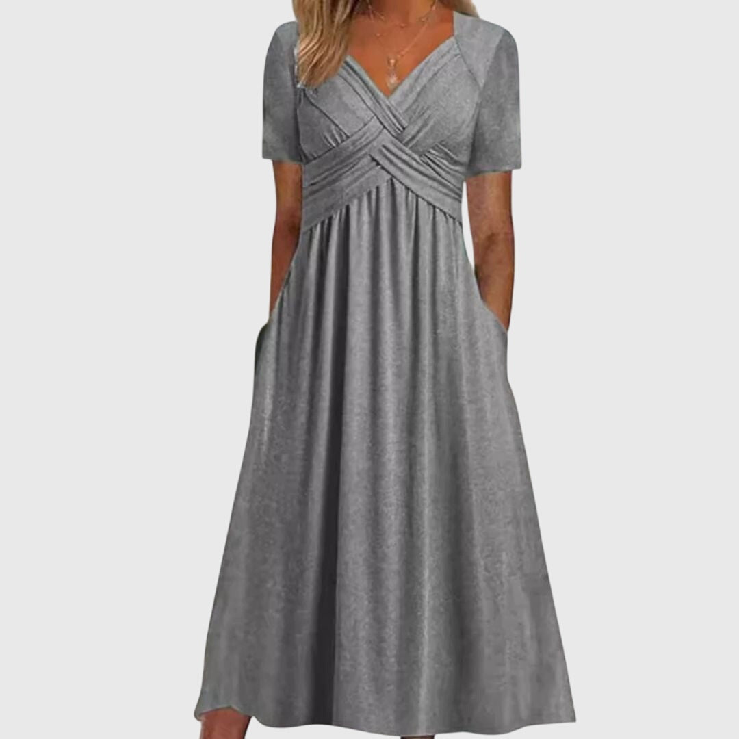 Robe Amanda de Danoir Paris en bleu, coupe flatteuse, vue de devant avec détails du tissu et style élégant.