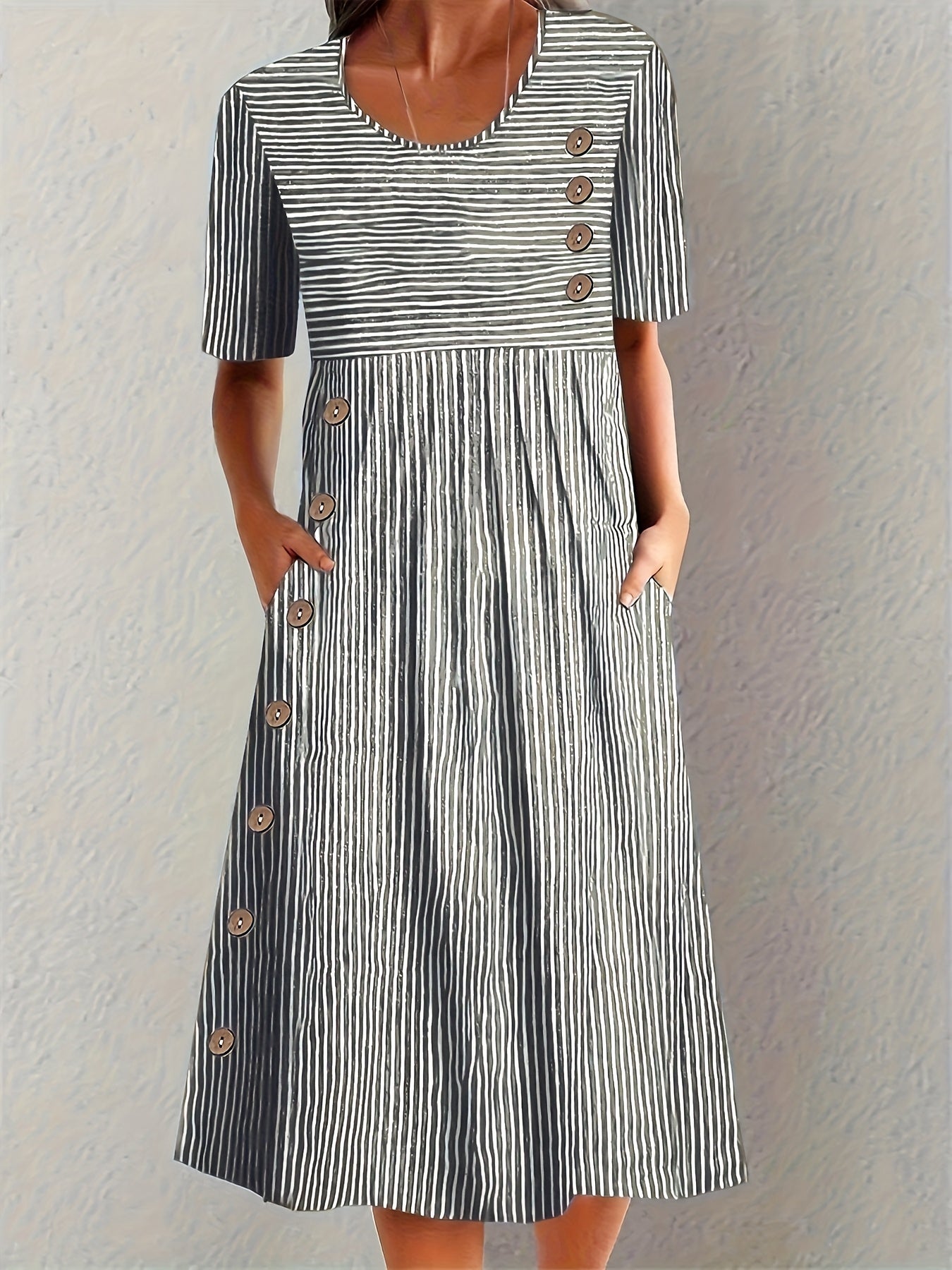 Robe d'été rayée Sofia™ de Danoir Paris, modèle bleu, taille XS, vêtement léger avec rayures bleues et blanches.