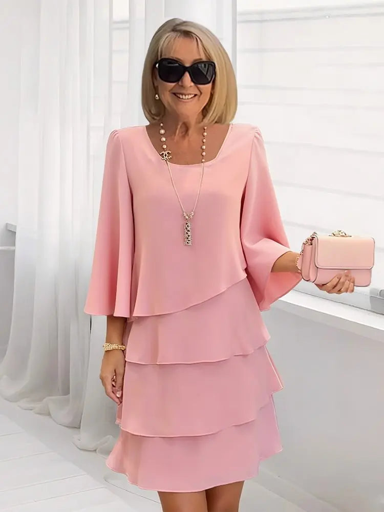Robe élégante Danoir Paris Catherine avec volant, couleur blush, tissu confortable, pour femme, vue de face.