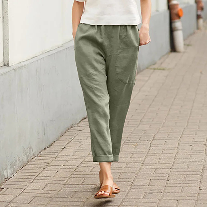 Pantalons amples blancs Kriza de Danoir Paris avec poches, parfaits pour un style décontracté et confortable.