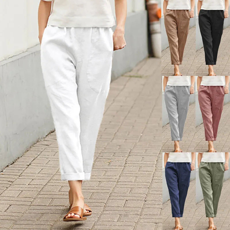Pantalons amples blancs Kriza de Danoir Paris avec poches, vêtement de bas large pour femme, vue de face.