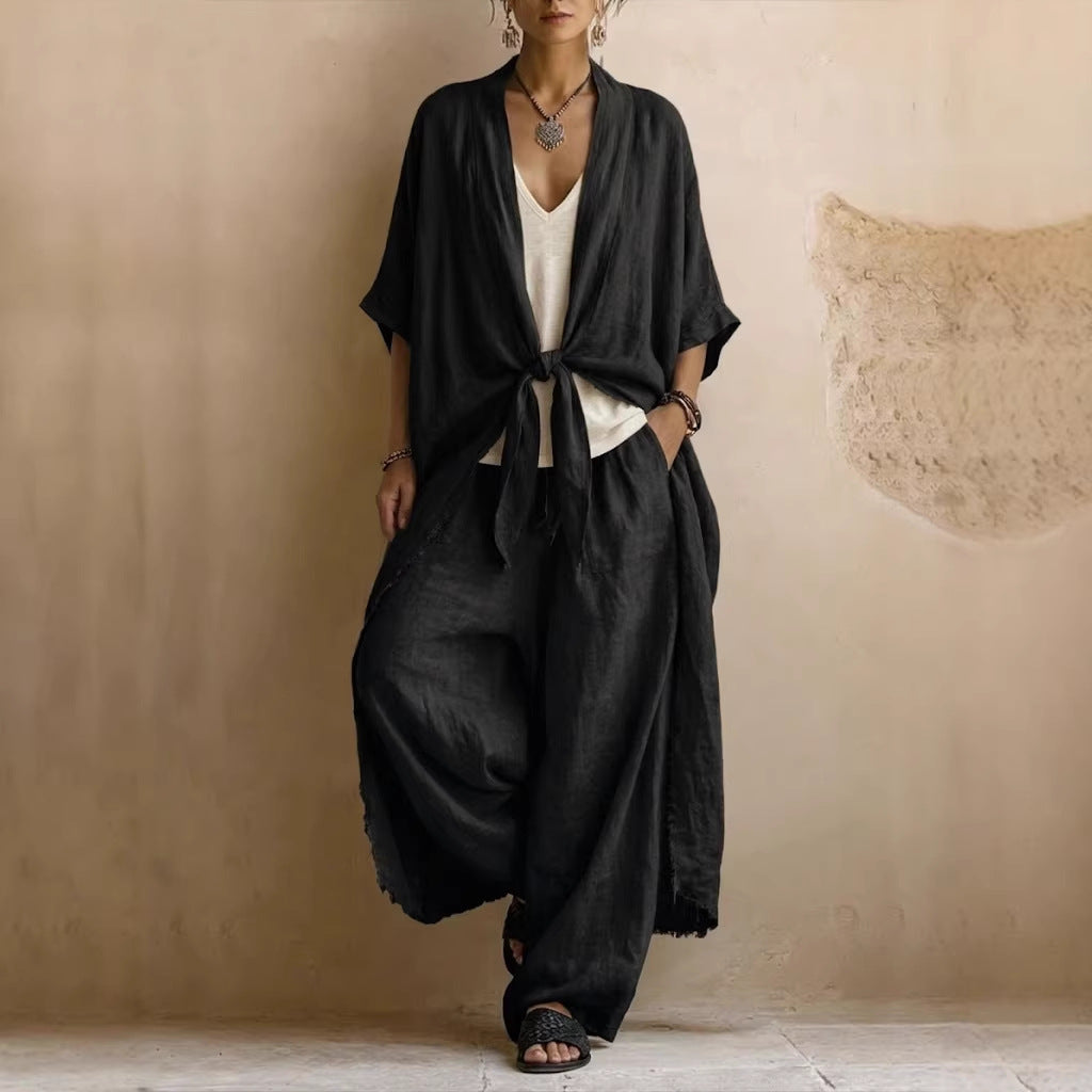 Ensemble deux pièces kimono en lin oversized et pantalons à jambes larges de Danoir Paris, couleur marron.