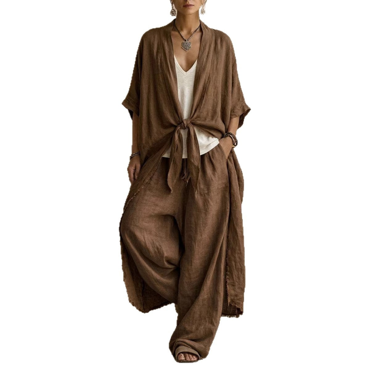 Ensemble deux pièces en lin oversize Kimono et pantalons larges de Danoir Paris, couleur marron, porté avec style décontracté.