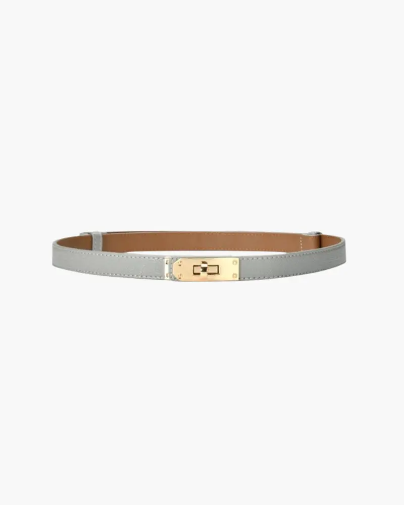 Ceinture vintage fine de Danoir Paris en cuir marron, style épuré et largeur slim, pour un look élégant et sophistiqué.