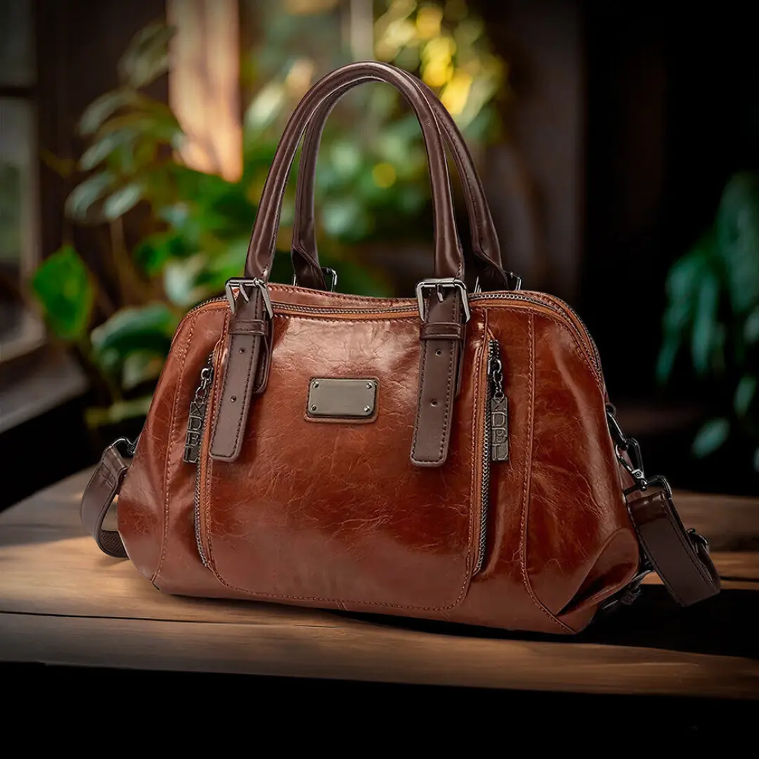 Sac à déclaration élégant Silke Heritage de Danoir Paris, en brun avec détails raffinés, pour un style sophistiqué.