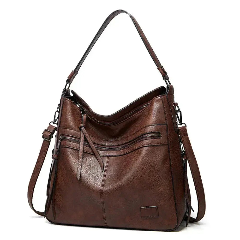 Sac Lilla Danoir Paris, sac opulent au design intemporel avec détails élégants, vue en gros plan sur le cuir et les poignées.