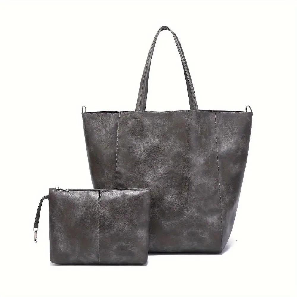 Grand sac à main vintage Danoir Paris Renee, élégant, en cuir marron avec détails classiques, idéal pour un style sophistiqué.