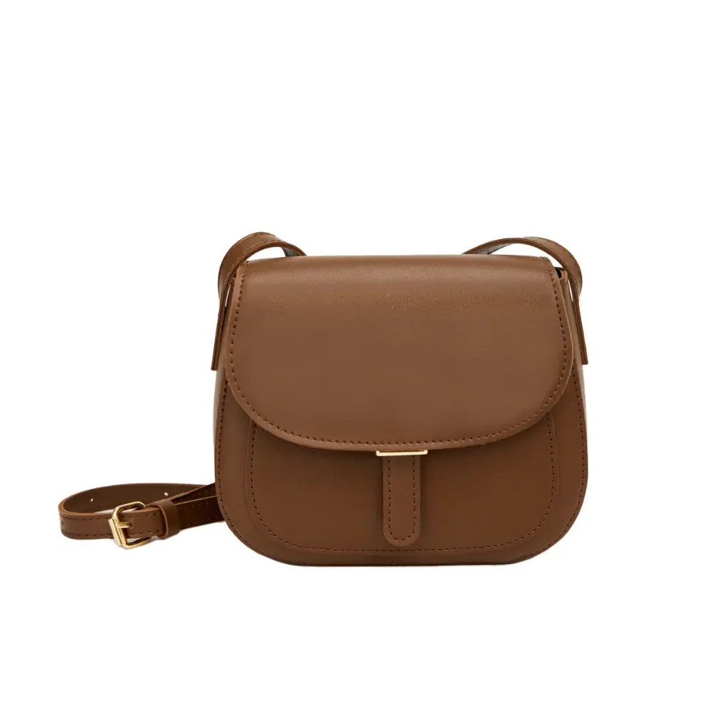 Sacoche de selle vintage Danoir Paris Sophie, style rétro, en cuir marron avec boucle métallique, adaptée pour vélo.