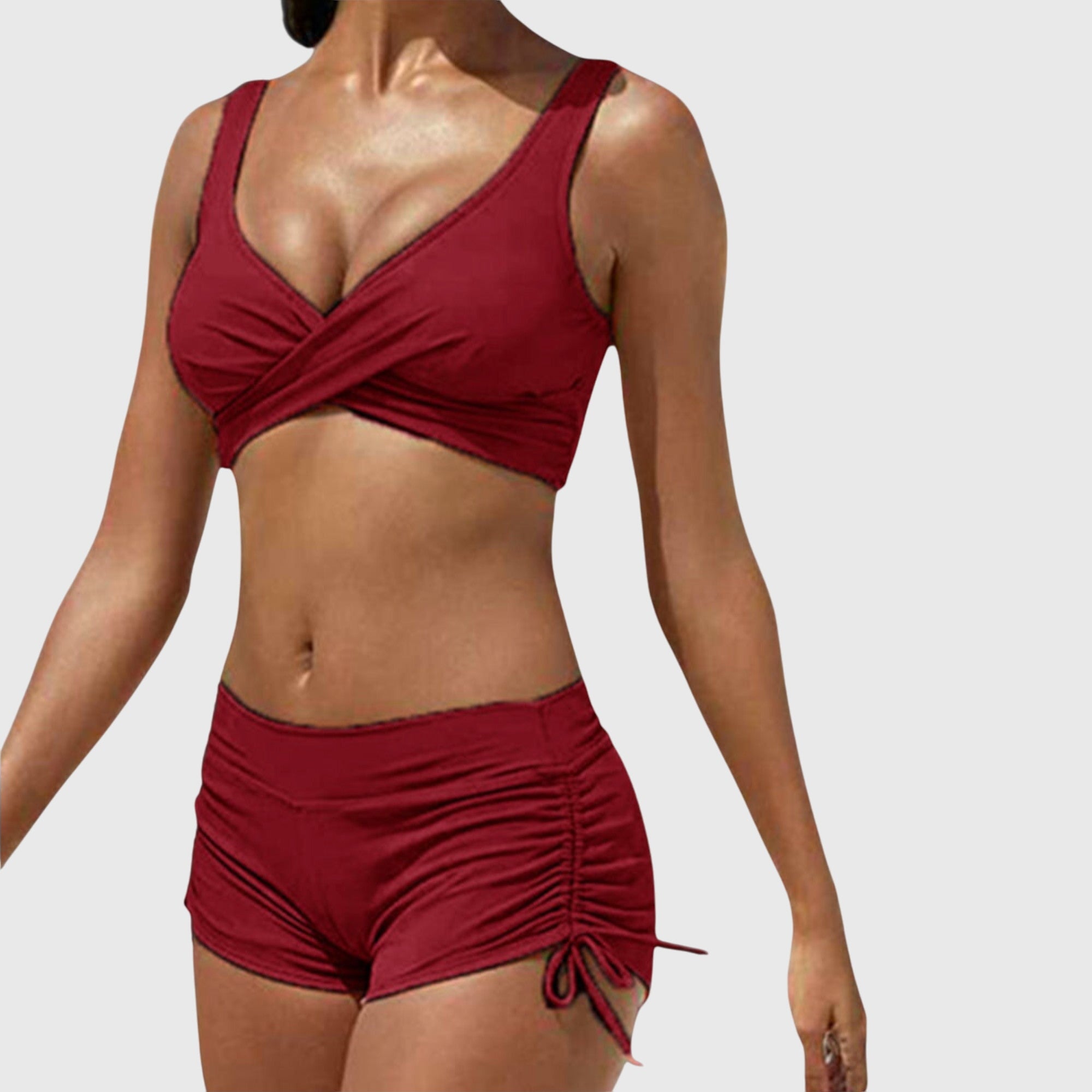 Bikini stylé Anabella de Danoir Paris avec motif camouflage, haut et bas assortis, porté sur une mannequin en maillot de bain.