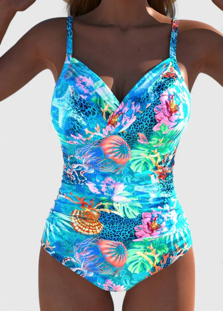 Maillot de bain sophistiqué Meloryanne de Danoir Paris en cyan, design élégant avec détails modernes, porté sur mannequin.