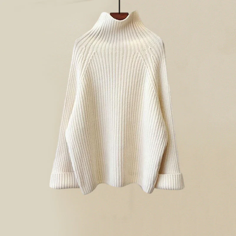 Ensemble tricoté douillet Gabby pour femmes de Danoir Paris, vêtement blanc avec détails confortables.