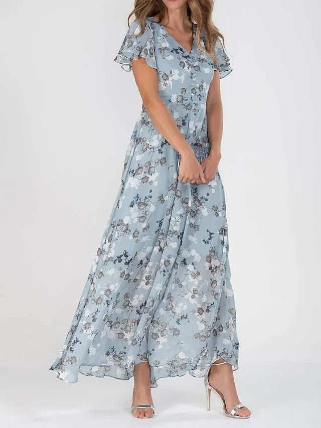 Robe fluide orange Zuri de Danoir Paris, coupe flatteuse avec style élégant, portée en mode décontracté ou habillé.