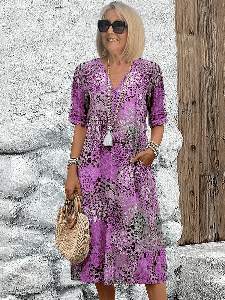 Robe d'été Skyler Danoir Paris en tissu léger bleu océan, coupe fluide et manches courtes, parfait pour l'été.