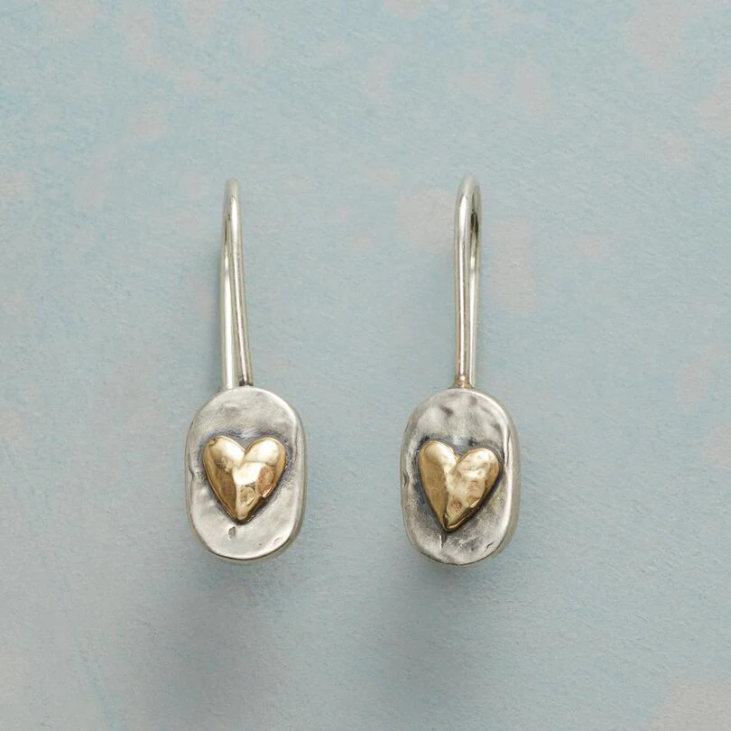 Boucles d'oreilles en cœur en argent et or de Danoir Paris, finition élégante et finition brillante.