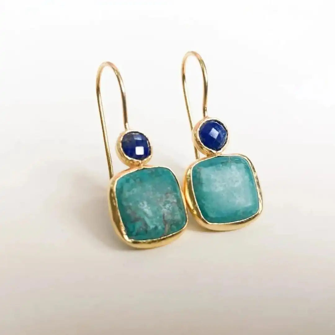 Boucles d'oreilles vintage ornées en or avec turquoise de la marque Danoir Paris, détails élaborés et design élégant.