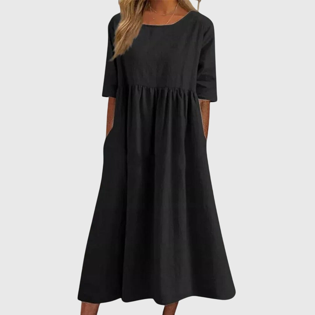 Robe blanche Danoir Paris Ariette™ élégante et fluide, parfaite pour toutes les occasions, vue de face sur fond neutre.