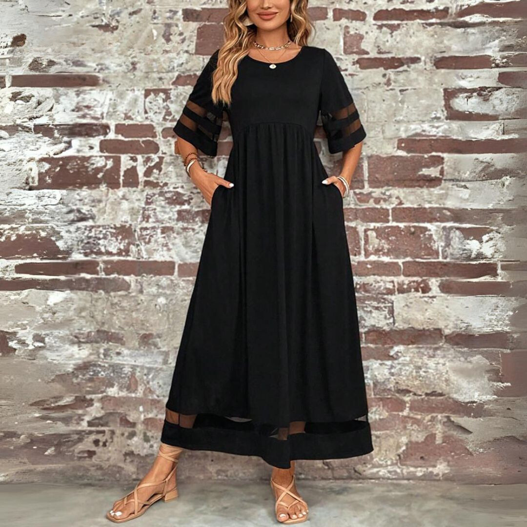 Robe midi noire Danoir Paris Aubrée, robe élégante et flatteuse avec coupe confortable, portée pour différentes occasions.