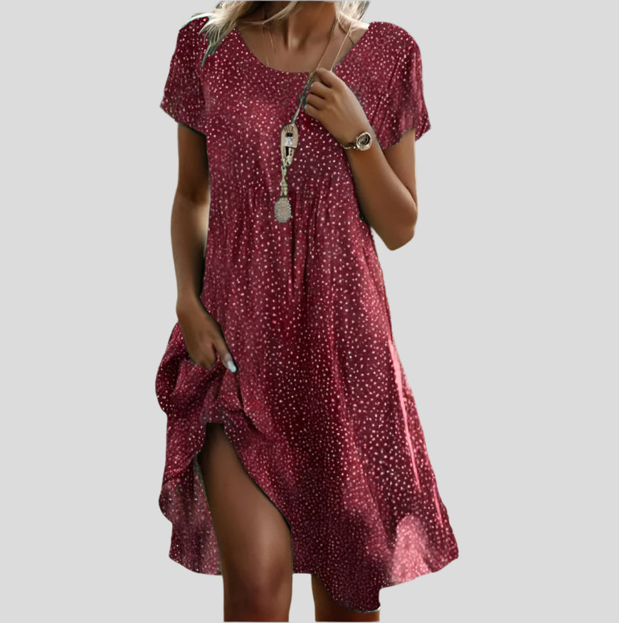 Robe bohème élégante Danoir Paris, multicolore, avec détails floraux, portée décontractée et style raffiné.