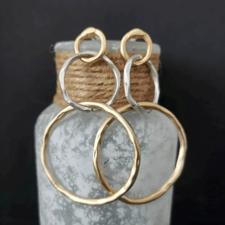 Boucles d'oreilles vintage en or et argent Danoir Paris, finition élégante avec détails rétro, parfaites pour un style chic.