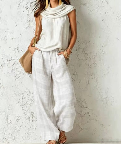 Ensemble Élise Danoir Paris, style simple et naturel, en vert, avec coupe élégante et détails subtils.