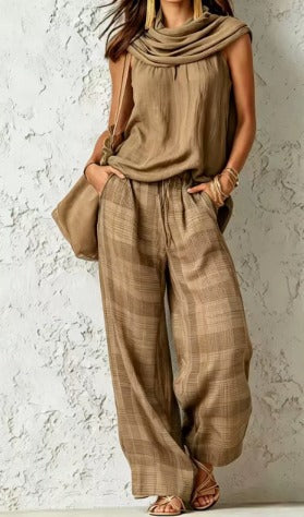 Ensemble Élise de Danoir Paris en vert, style simple et naturel, visible en haut avec détails du tissu et coupe.