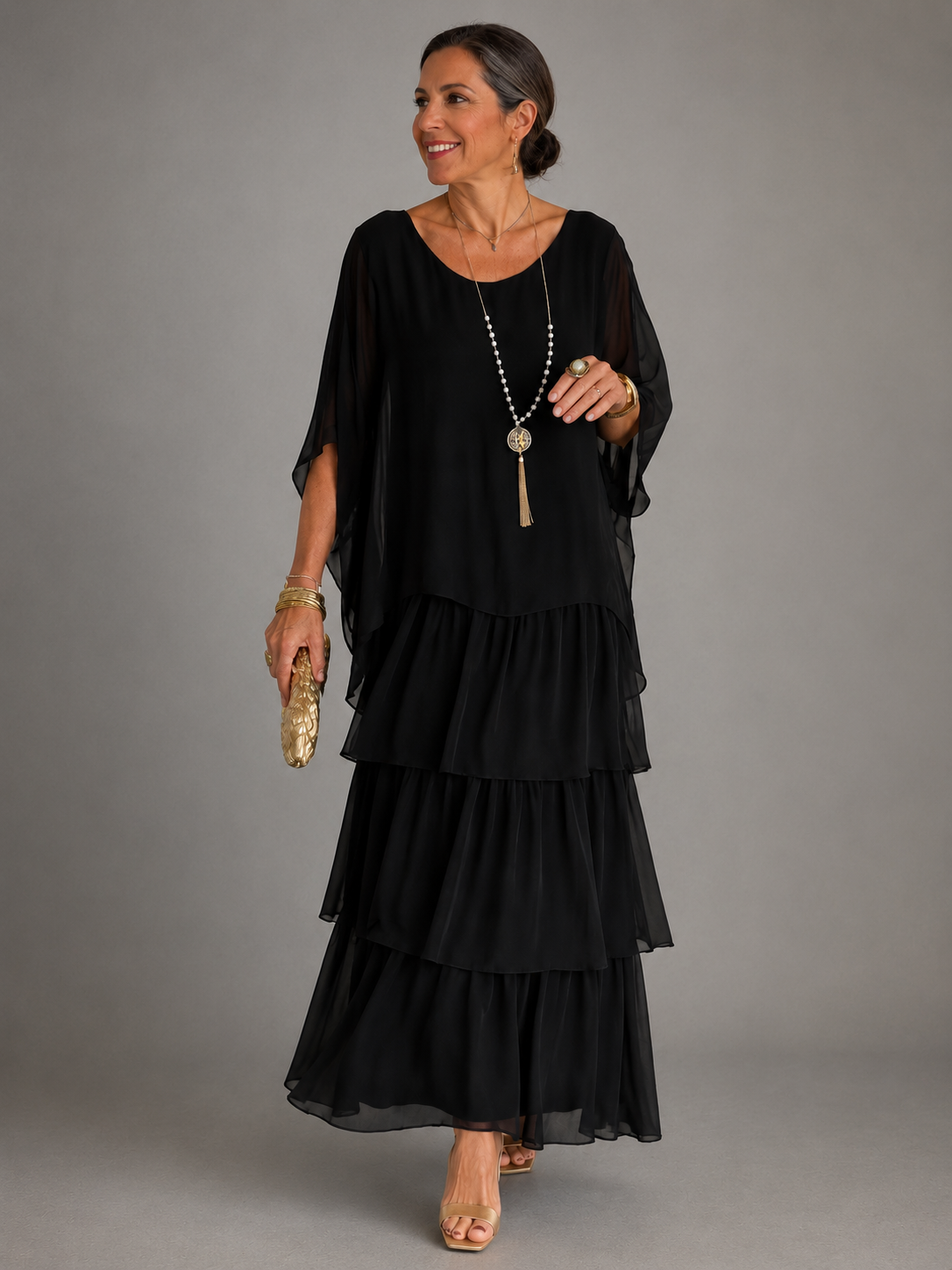 Robe maxi fluide élégante Danoir Paris pour femme, couleur verte foncée, détail de tissu léger et coupe sophistiquée.