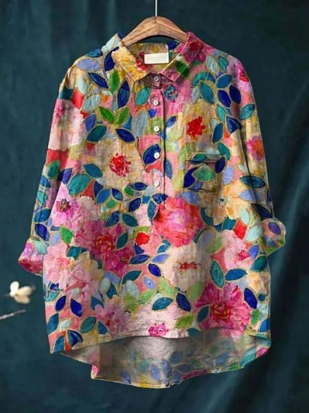 Blouse florale élégante Lila de la marque Danoir Paris, tissu léger avec motif floral coloré sur fond clair.