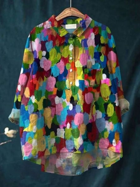 Blouse florale élégante Lila de la marque Danoir Paris, avec motifs floraux et coupe sophistiquée.