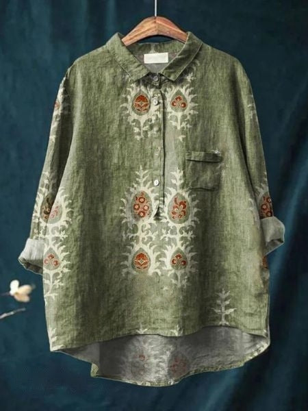 Blouse florale élégante Lila de Danoir Paris, en tissu léger avec motifs floraux colorés et manches longues.