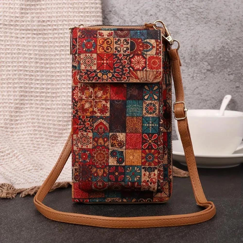 Sac d'épaule Nina Danoir Paris avec motif floral bohème, accessoire élégant en tissu coloré et détails floraux.