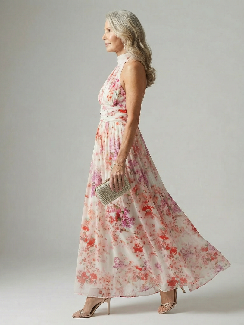 Robe longue fluide Elyon Danoir Paris avec motif floral, manches courtes et coupe élégante pour un style léger et chic.