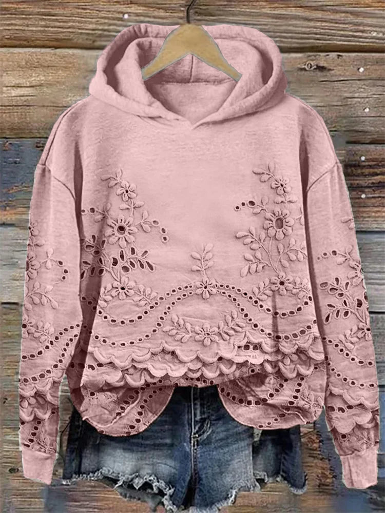 Pull féminin rose Sofie de Danoir Paris, style ludique avec détails modernes, porté sur mannequin.