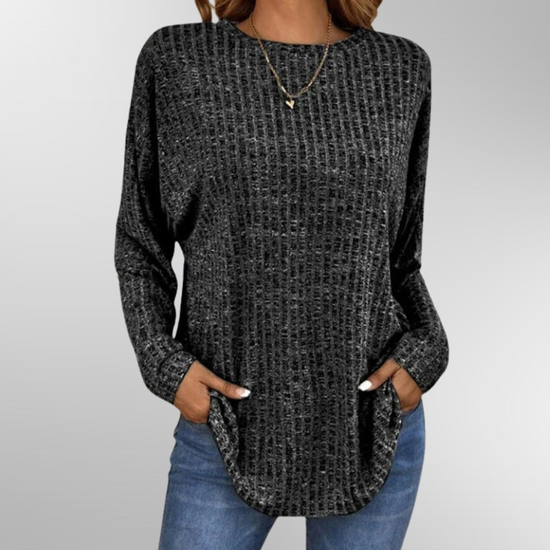 Haut élégant et polyvalent Isabelle de Danoir Paris en noir, veste chic avec détails sophistiqués pour femmes.