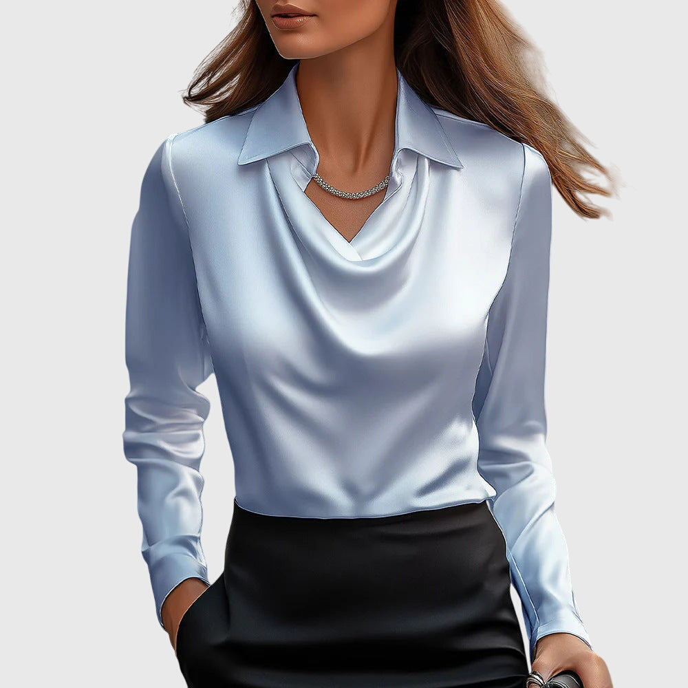 Blouse satinée élégante Brooklyn de Danoir Paris, en taille XS, couleur or, avec un style sophistiqué et féminin.