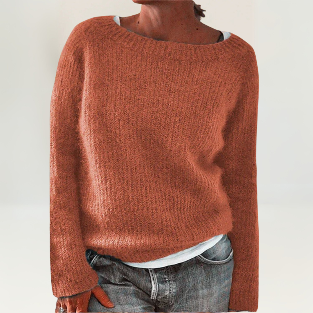 Pull orange Danoir Paris Suzy, confortable et élégant, avec col rond et manches longues, porté sur un mannequin.