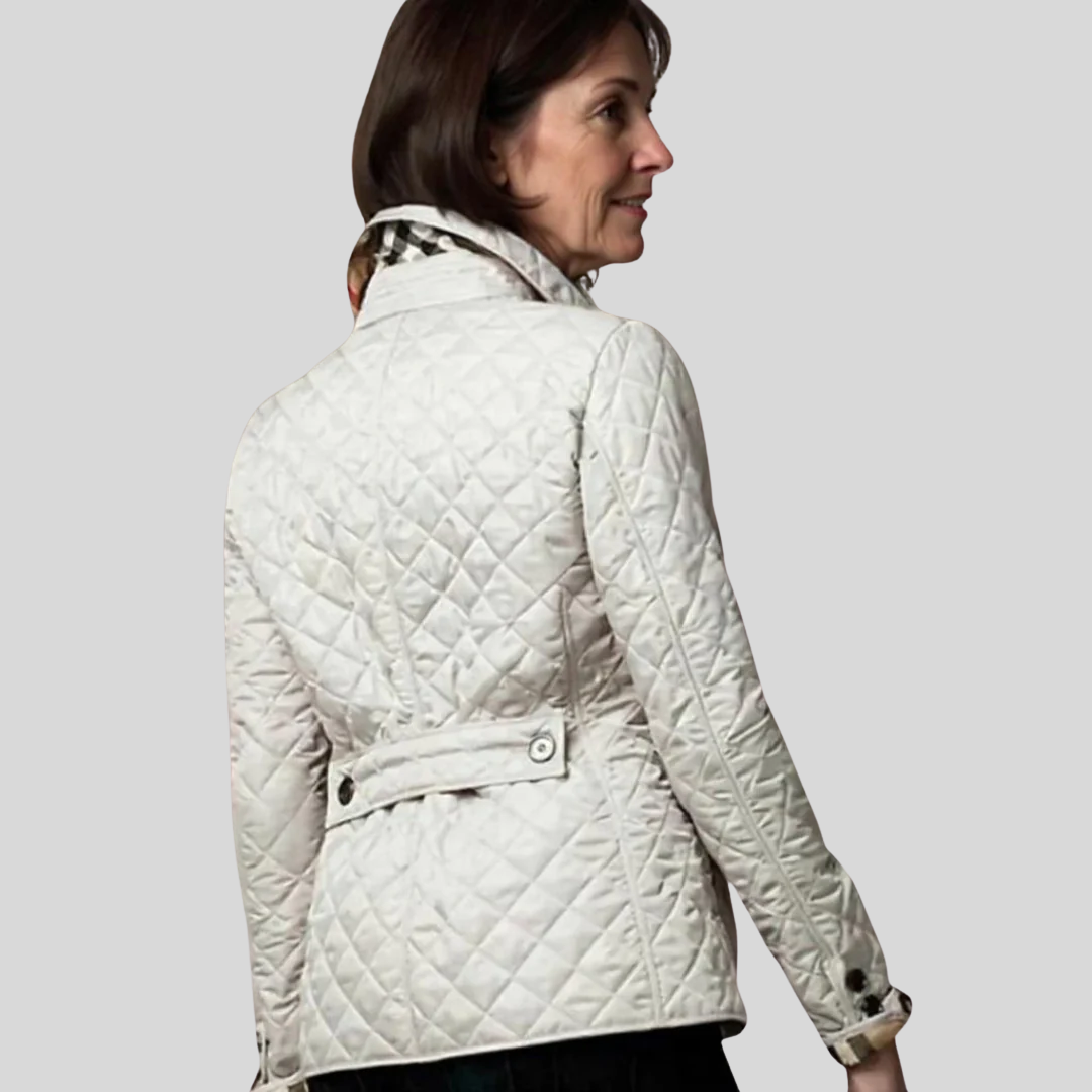 Veste matelassée élégante Danoir Paris Verity en bleu, style sophistiqué avec coupe moderne et détails raffinés.